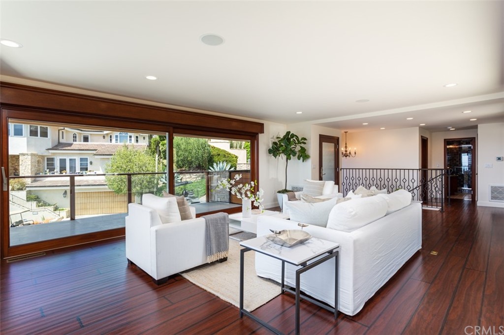 434 Emerald Bay Laguna Beach, CA 92651 - Photo 6 of 39 a living room with furniture and a large window
