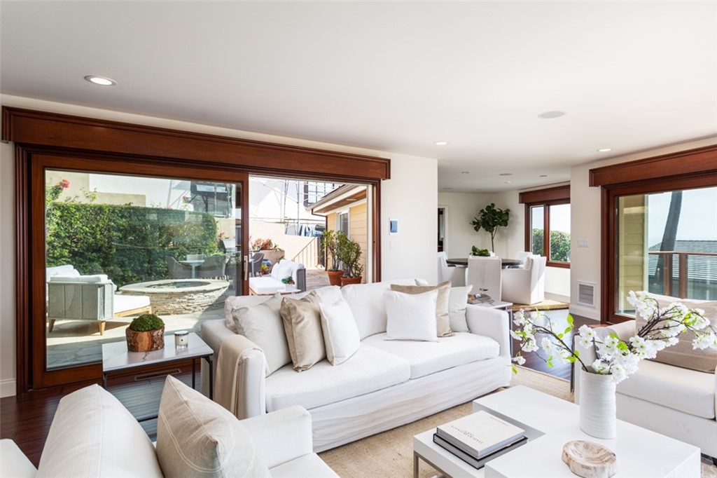 434 Emerald Bay Laguna Beach, CA 92651 - Photo 8 of 39 a living room with furniture and a large window