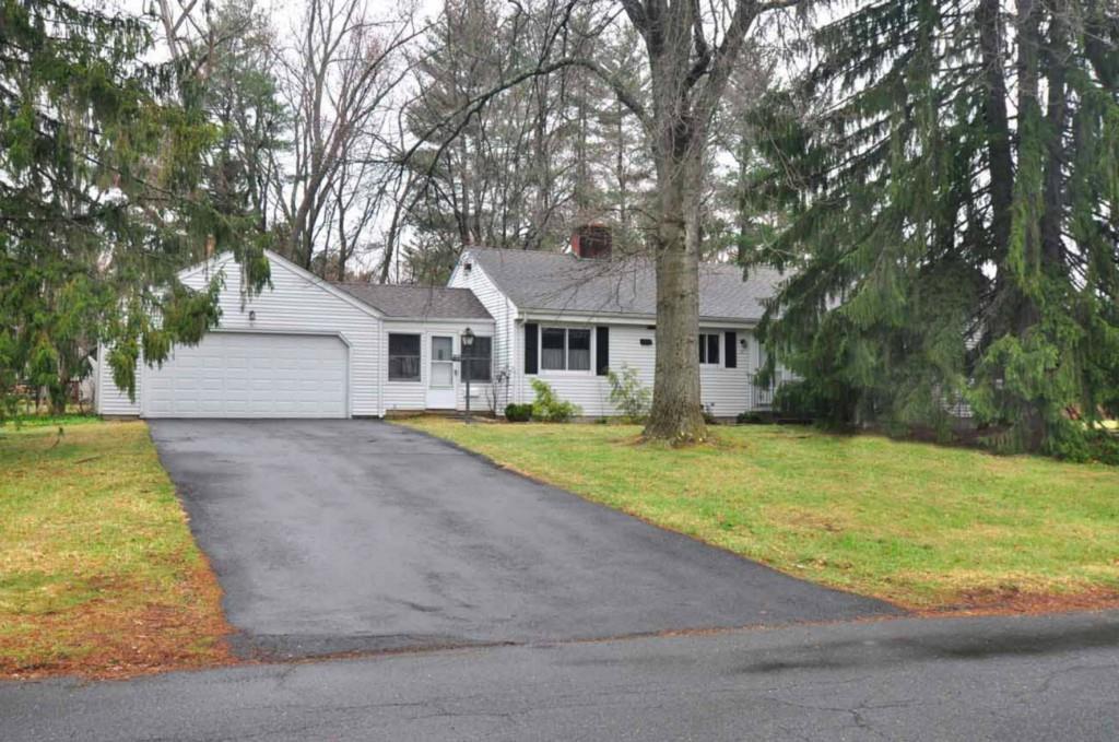 10 Westbrook Road Bloomfield, CT 06002 - Photo 1 of 1 a front view of a house with a yard and trees