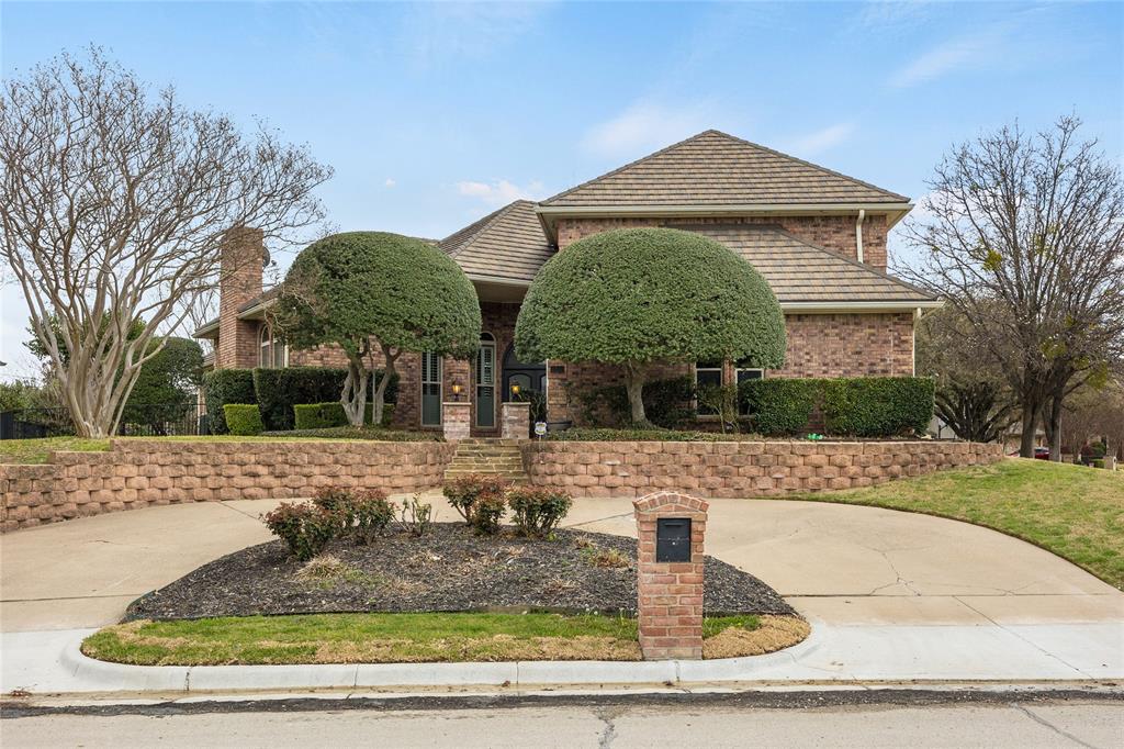1201 Findlay Drive Arlington, TX 76012 - Photo 1 of 35 a front view of a house with garden