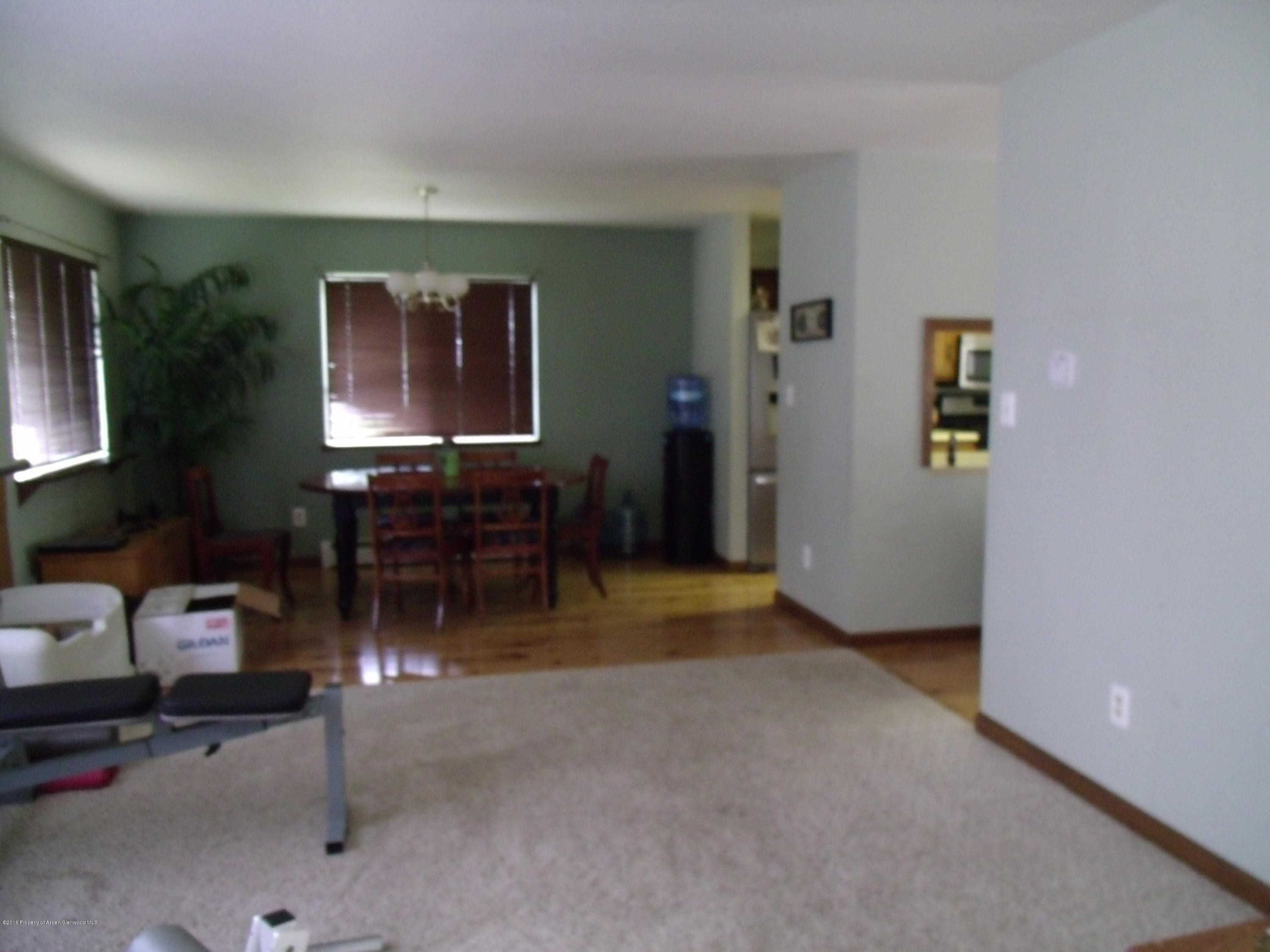 610 Ash Avenue Rifle, CO 81650 - Photo 10 of 18 a view of livingroom with furniture and workspace
