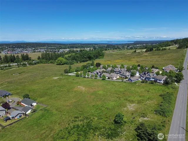 a view of a house with a big yard
