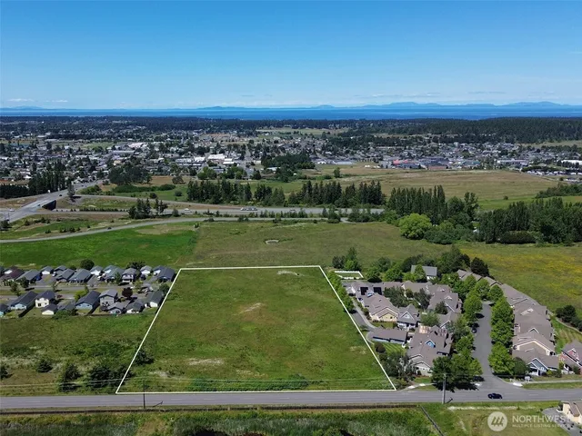 an aerial view of a houses with outdoor space