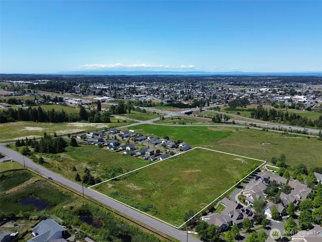 a view of a golf course with a lake