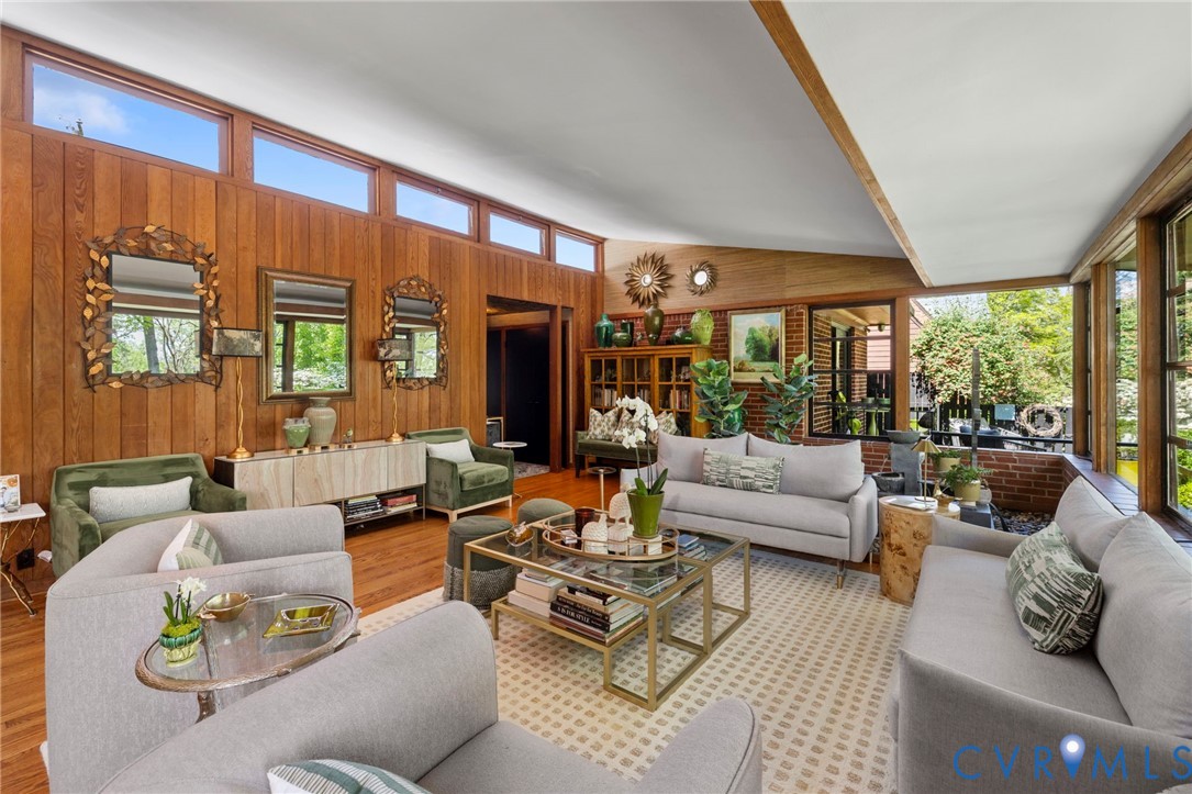 4904 Riverside Drive Richmond, VA 23225 - Photo 14 of 42 a living room with furniture and large windows