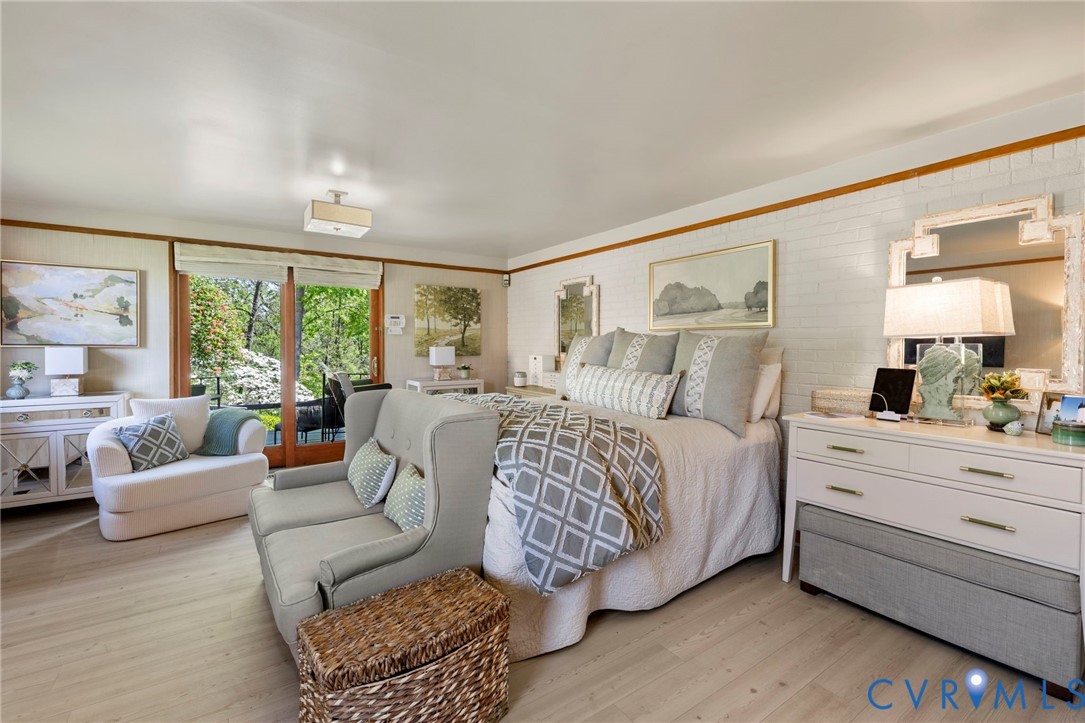 4904 Riverside Drive Richmond, VA 23225 - Photo 19 of 42 a bed room with a bed and a couch