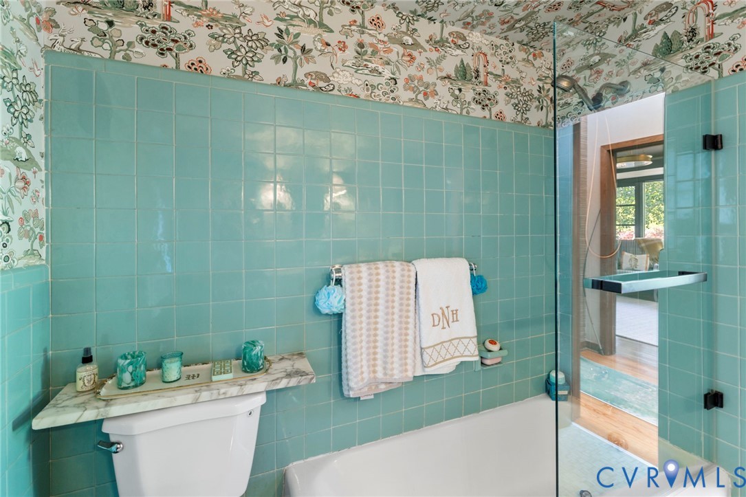 4904 Riverside Drive Richmond, VA 23225 - Photo 27 of 42 a bathroom with a sink toilet and shower