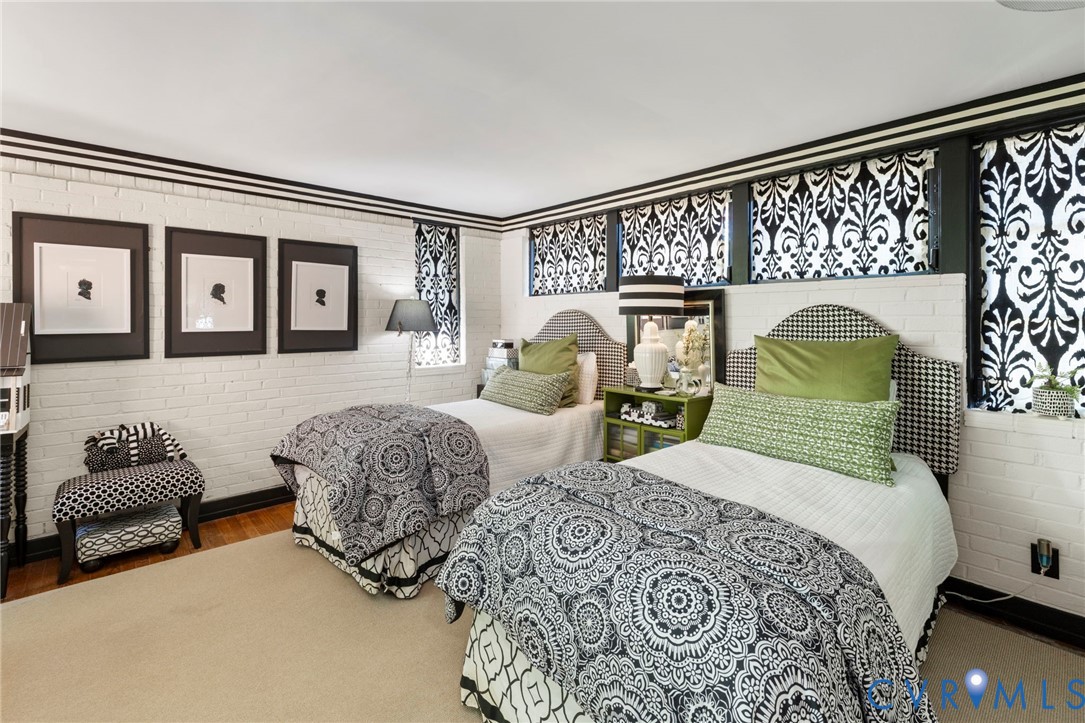 4904 Riverside Drive Richmond, VA 23225 - Photo 28 of 42 a bedroom with two beds and a couch