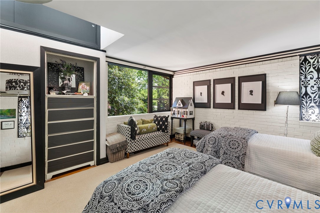 4904 Riverside Drive Richmond, VA 23225 - Photo 29 of 42 a living room with furniture lamp and large window