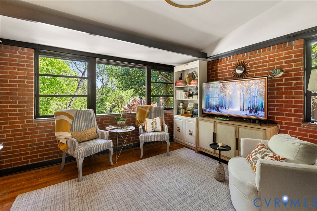 4904 Riverside Drive Richmond, VA 23225 - Photo 31 of 42 a room with furniture and a flat screen tv