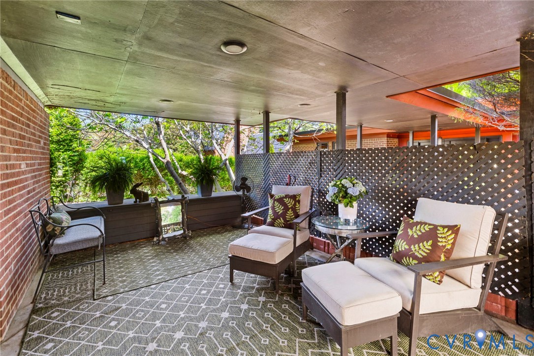 4904 Riverside Drive Richmond, VA 23225 - Photo 42 of 42 a outdoor living space with furniture and a rug