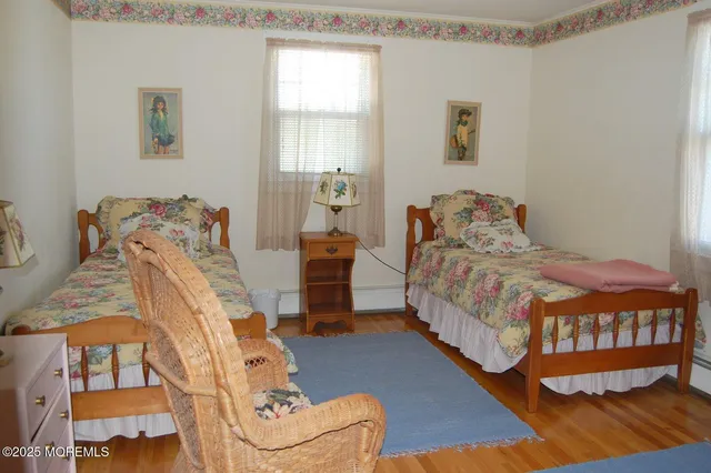 a kitchen with granite countertop a sink stove and cabinets