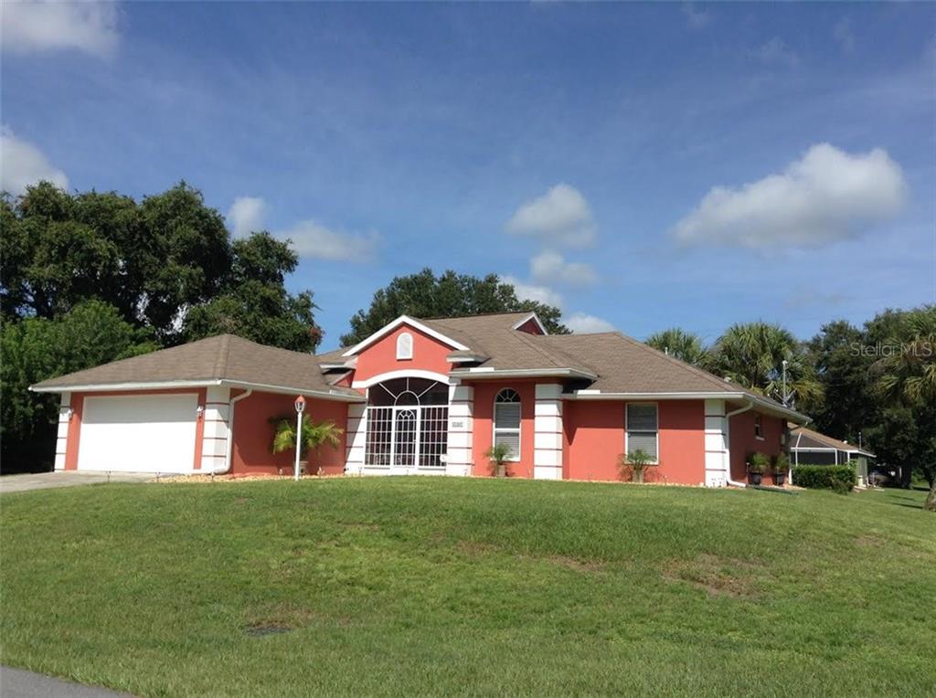 6604 Locher Road North Port, FL 34291 - Photo 1 of 1 Lovely home on an oversized corner lot, with a large screened entryway.