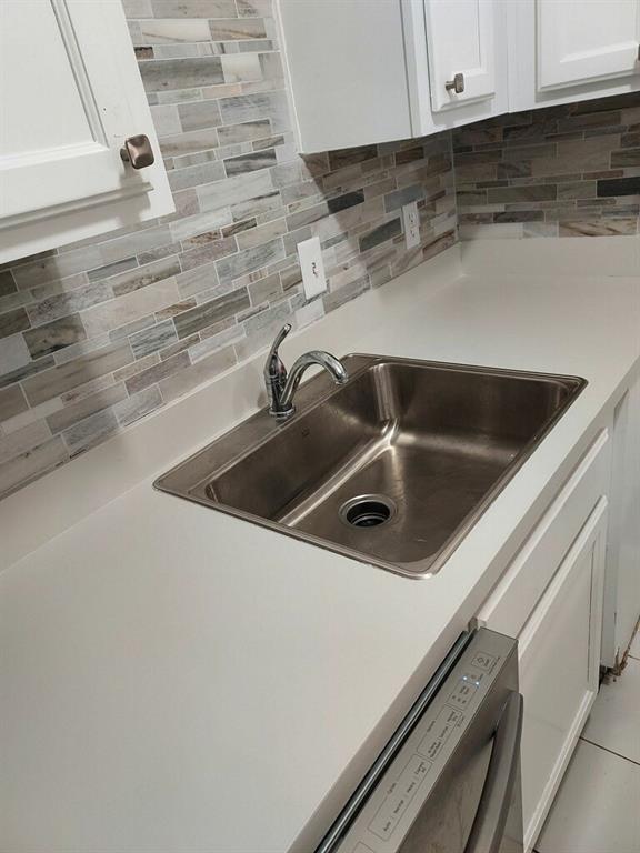 9817 Walnut Street, Unit 305 Dallas, TX 75243 - Photo 3 of 10 a close view of sink and tap