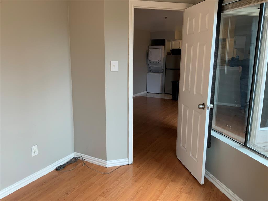 9817 Walnut Street, Unit 305 Dallas, TX 75243 - Photo 6 of 10 wooden floor in a gallery