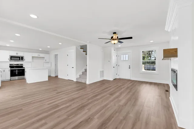a view of a livingroom with a hardwood floor