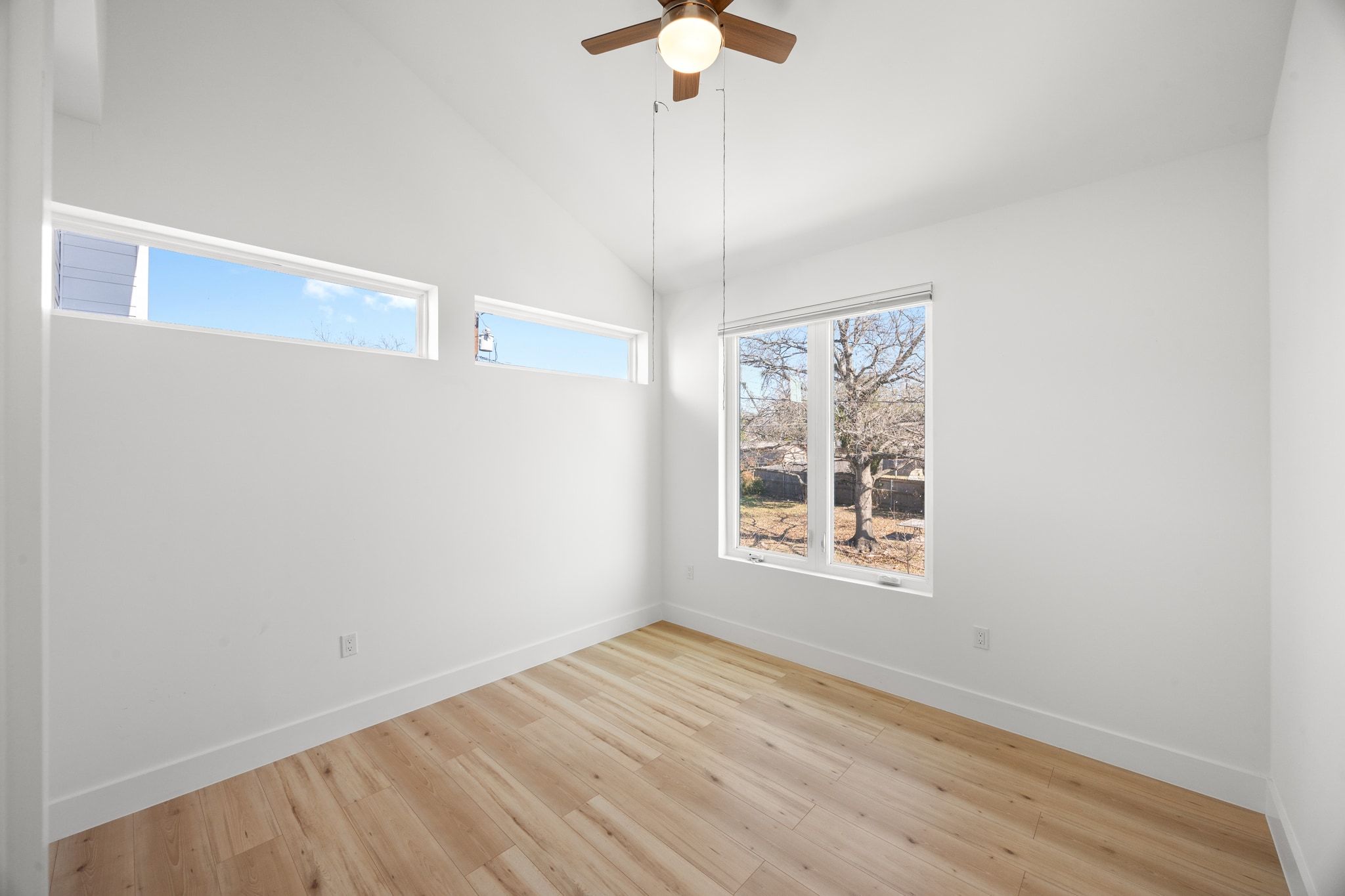 106 West Croslin Street, Unit 1 Austin, TX 78752 - Photo 18 of 31 a view of an empty room with a window