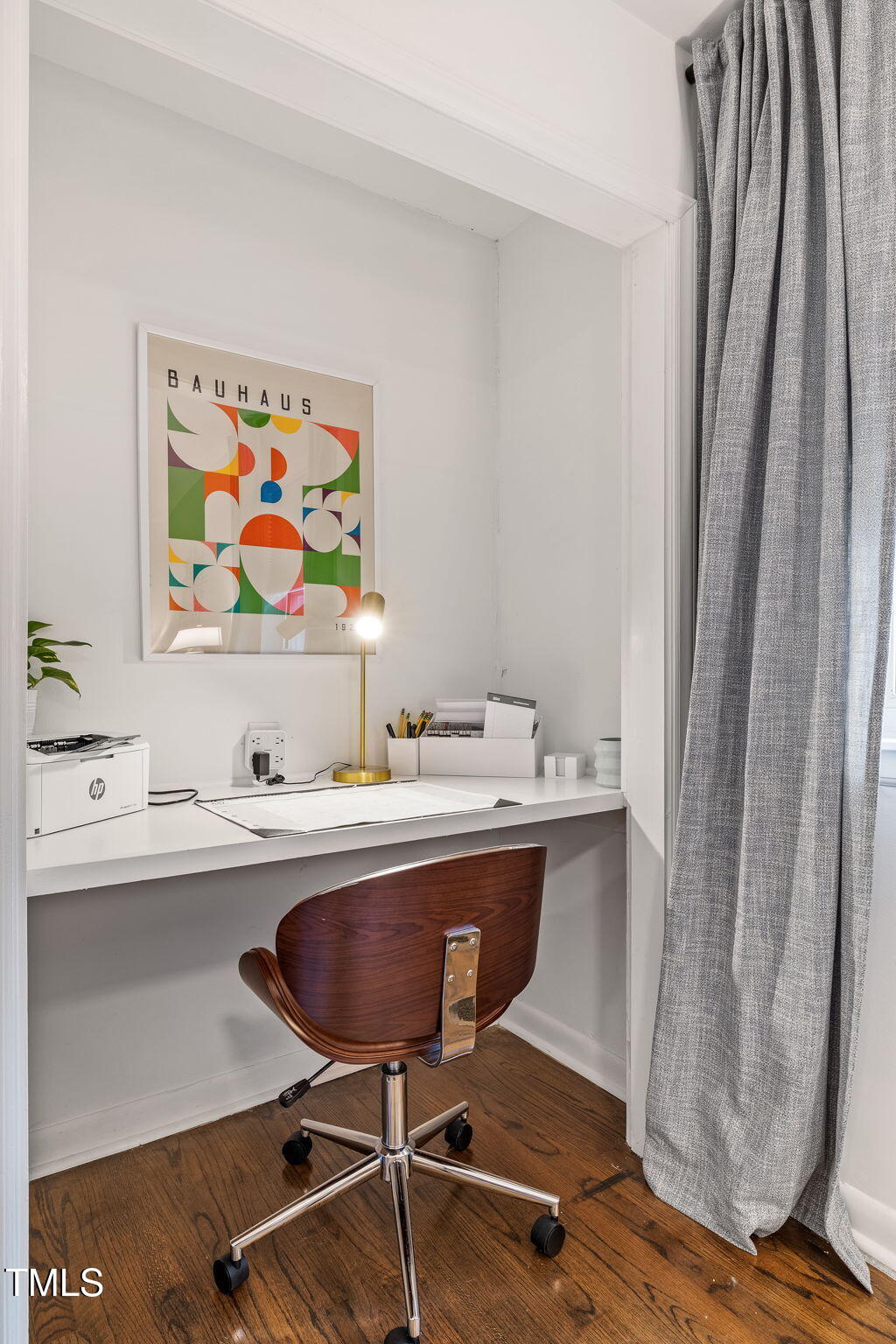 1911 Morehead Avenue Durham, NC 27707 - Photo 11 of 25 a view of a workspace with furniture and wooden floor