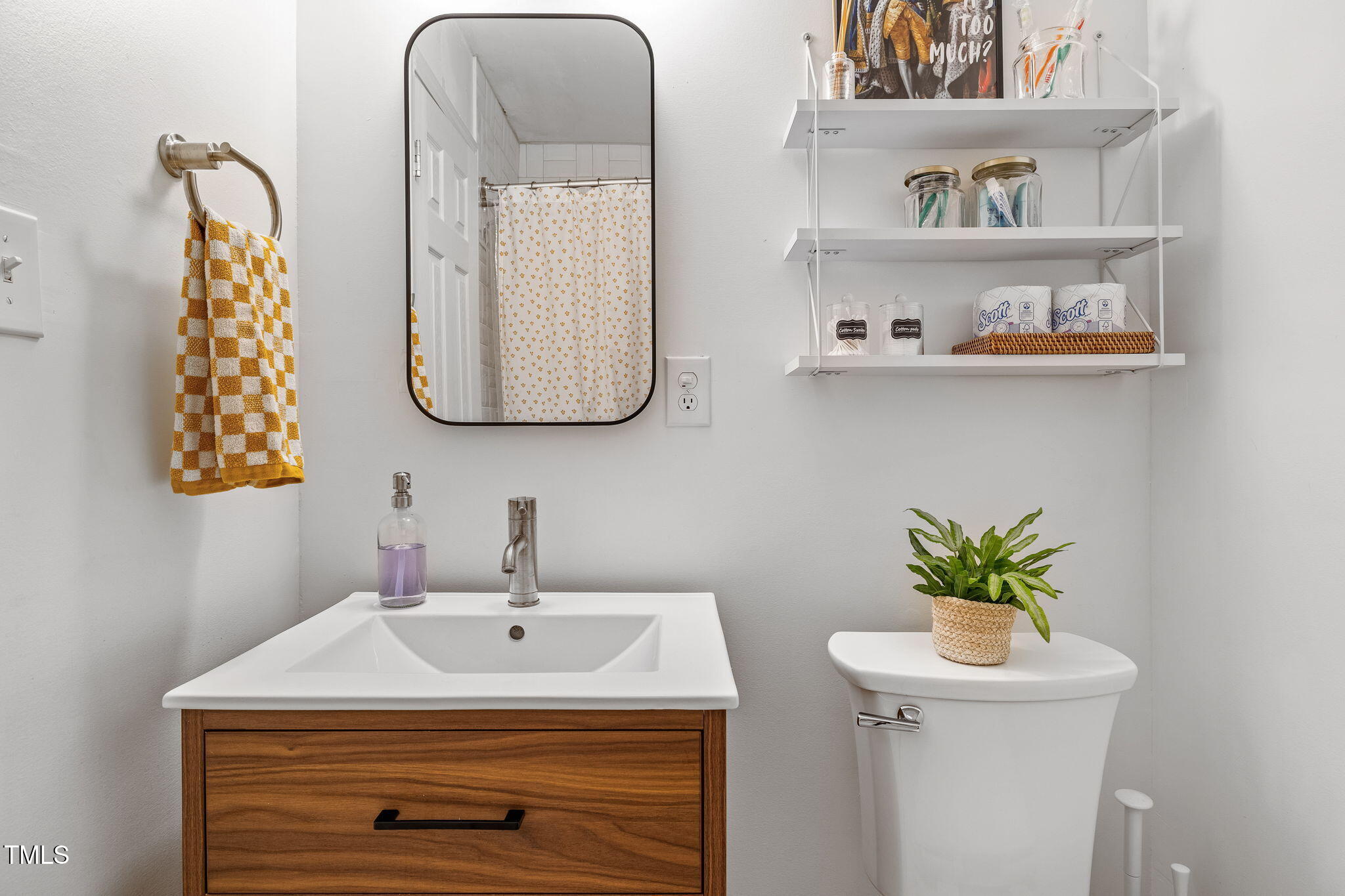 1911 Morehead Avenue Durham, NC 27707 - Photo 13 of 25 a room with a sink and a mirror