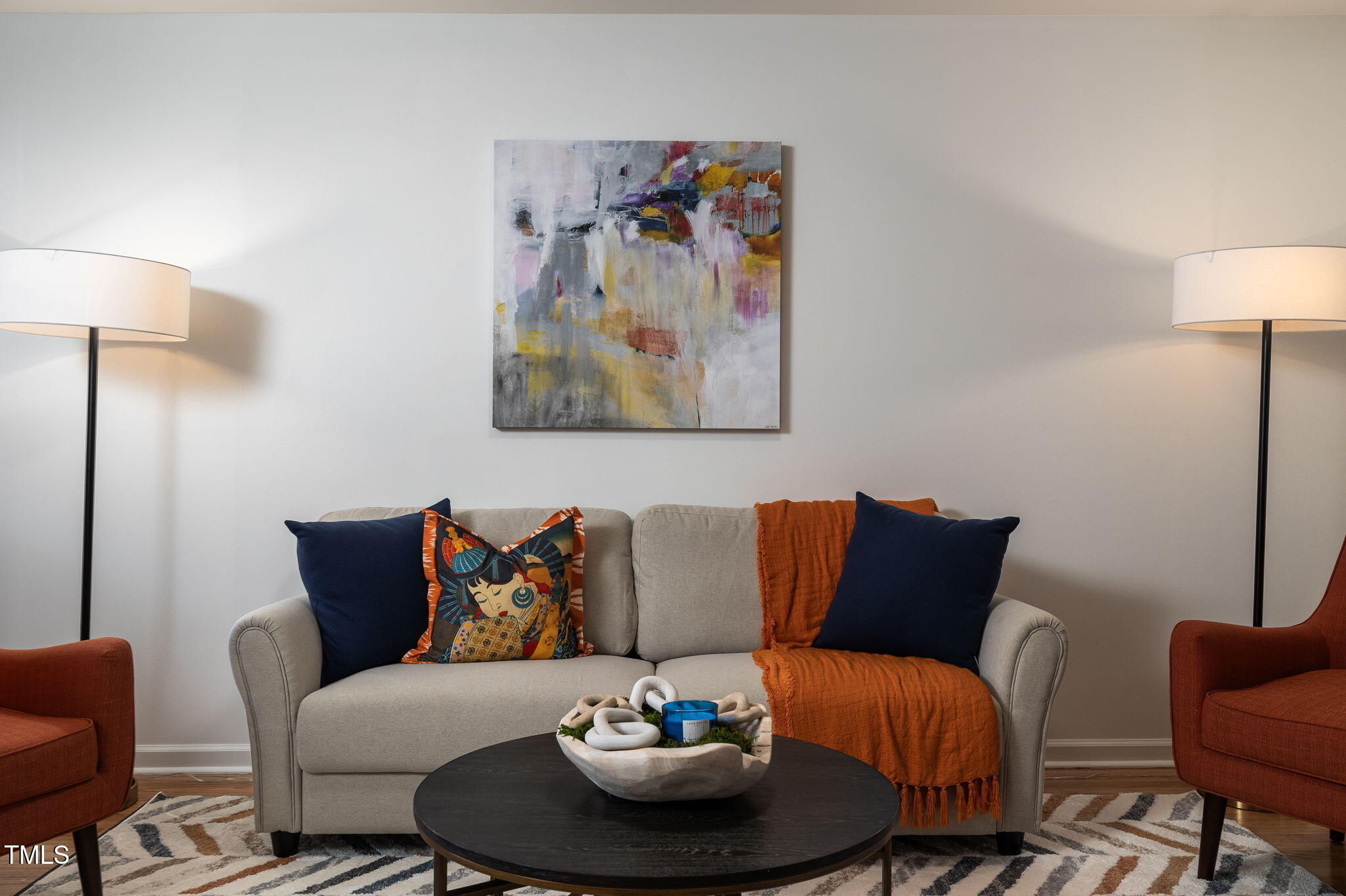1911 Morehead Avenue Durham, NC 27707 - Photo 17 of 25 a living room with furniture and a lamp