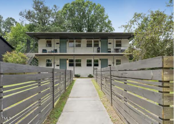 1911 Morehead Avenue Durham, NC 27707 - Photo 2 of 25 a front view of a house with a yard