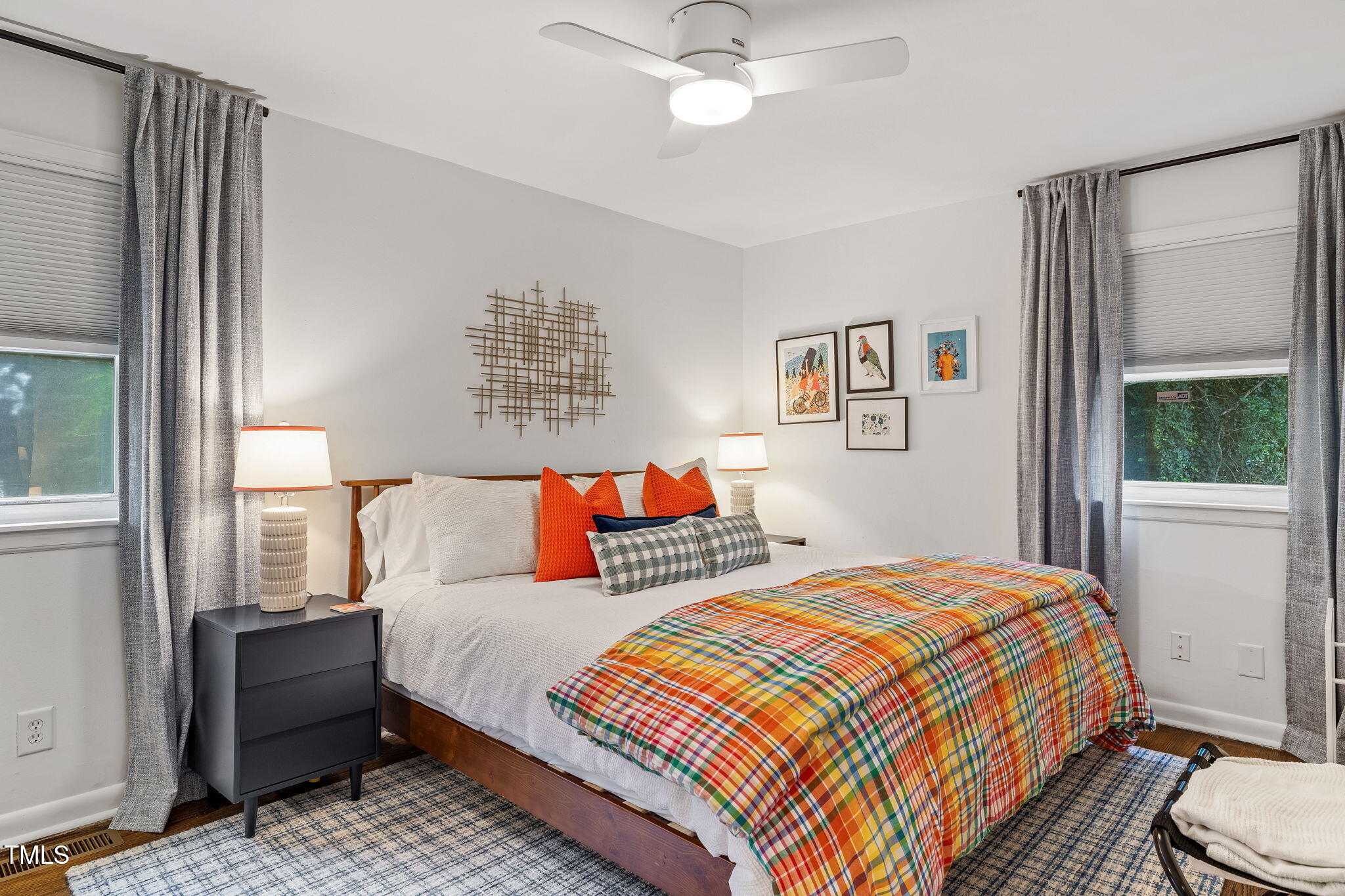 1911 Morehead Avenue Durham, NC 27707 - Photo 10 of 25 a bedroom with a bed and window