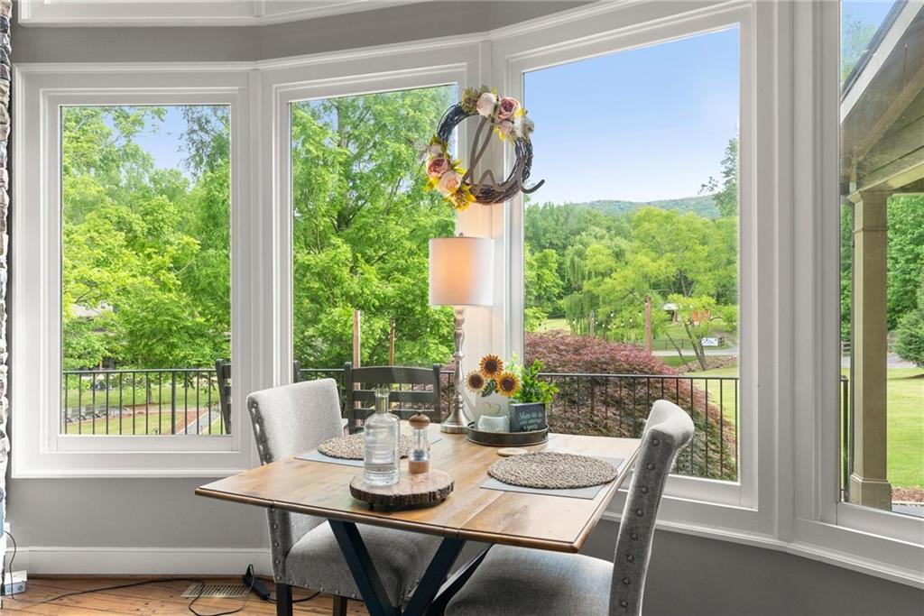 253 Happy Trails Way Jasper, GA 30143 - Photo 87 of 97 a view of a dining room with furniture window and outside view