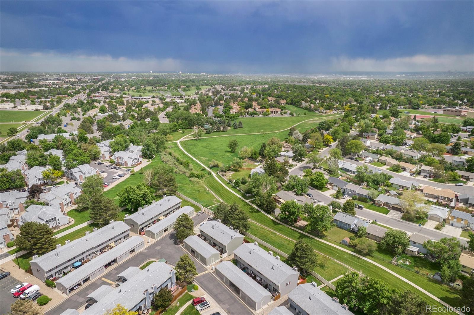 8642 Carr Loop Arvada, CO 80005 - Photo 21 of 22 an aerial view of residential houses with outdoor space