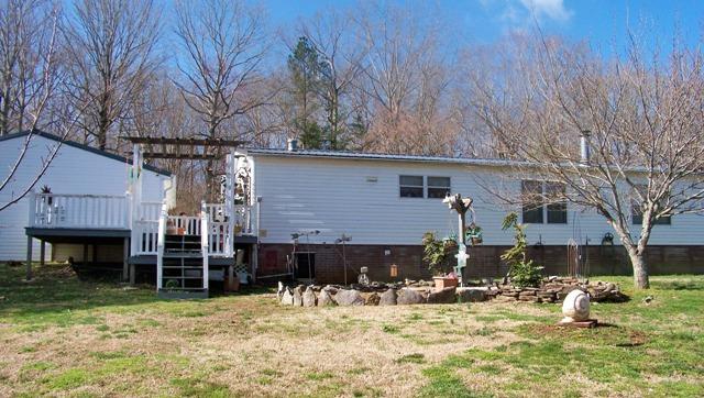 8132 Chestnut Ridge Road Lynchburg, TN 37352 - Photo 15 of 20 Back view of the house and deck for entertaining