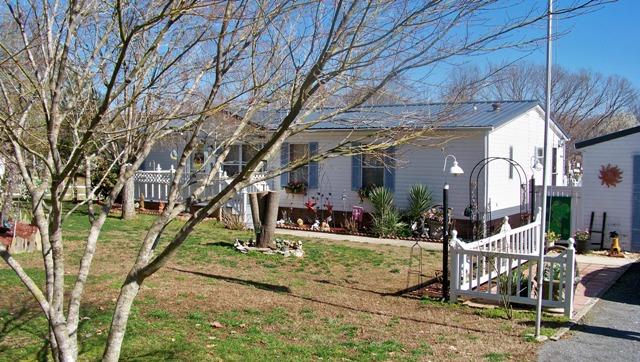 8132 Chestnut Ridge Road Lynchburg, TN 37352 - Photo 18 of 20 Closer look at the front and beautiful landscaping