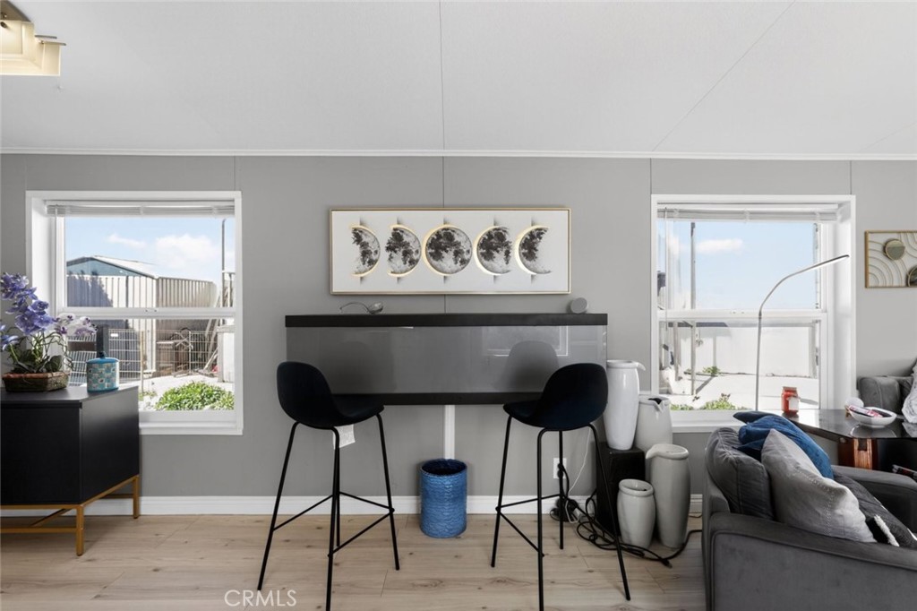 2801 Johnson Road, Unit 14 Frazier Park, CA 93225 - Photo 16 of 30 a living room with furniture and a painting on the wall