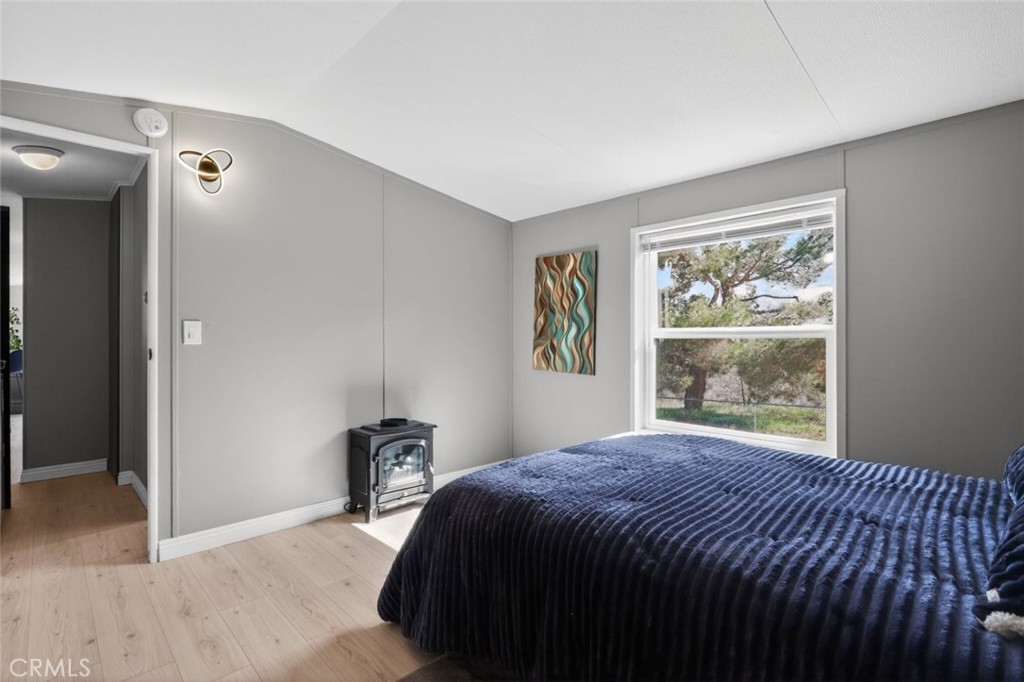 2801 Johnson Road, Unit 14 Frazier Park, CA 93225 - Photo 22 of 30 a bedroom with a bed and a window