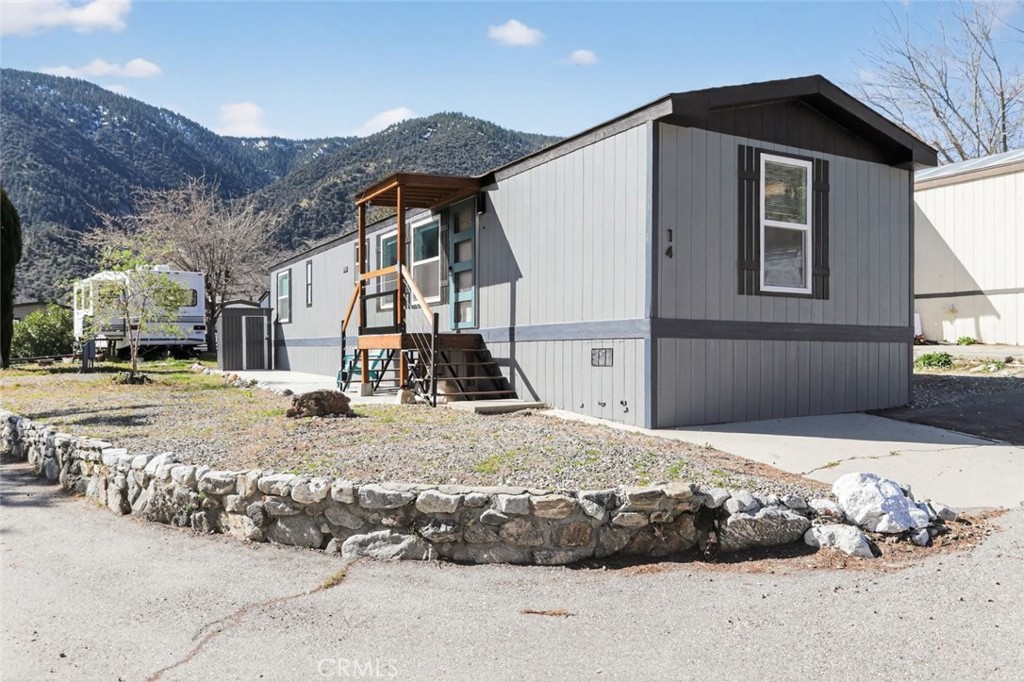 2801 Johnson Road, Unit 14 Frazier Park, CA 93225 - Photo 3 of 30 a view of a house with snow on the side of the road