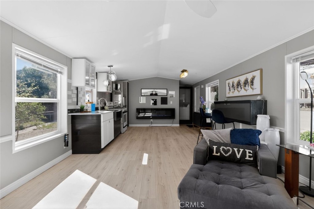 2801 Johnson Road, Unit 14 Frazier Park, CA 93225 - Photo 5 of 30 a living room with furniture and a large window