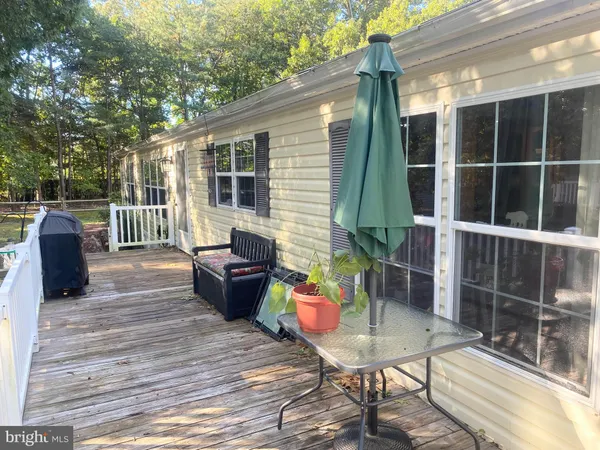 a backyard of a house with seating space