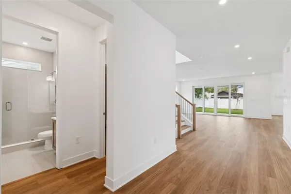 a view of entryway with wooden floor