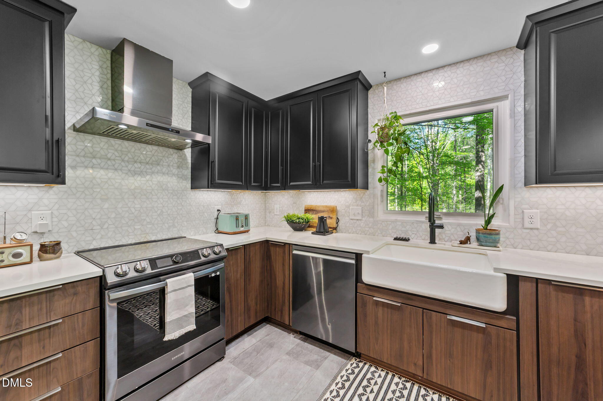 105 Barcliff Terrace Cary, NC 27518 - Photo 8 of 47 a kitchen with a sink stove top oven and cabinets