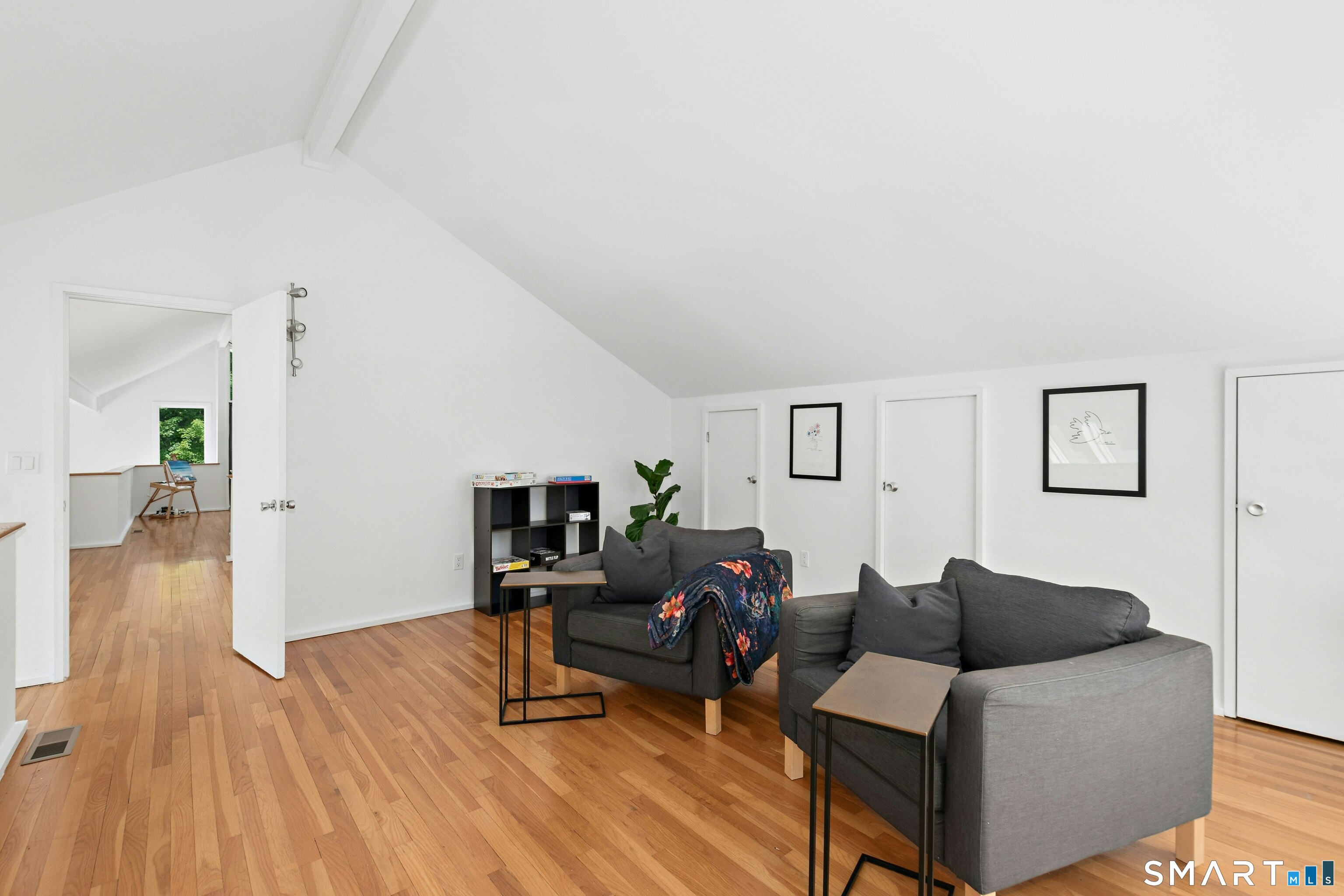 38 Old Redding Road Weston, CT 06883 - Photo 22 of 40 This is the Loft area that can also be accessed from the Primary Bedroom. It is currently used as a Sitting Room but is a flexible space for a variety of needs.