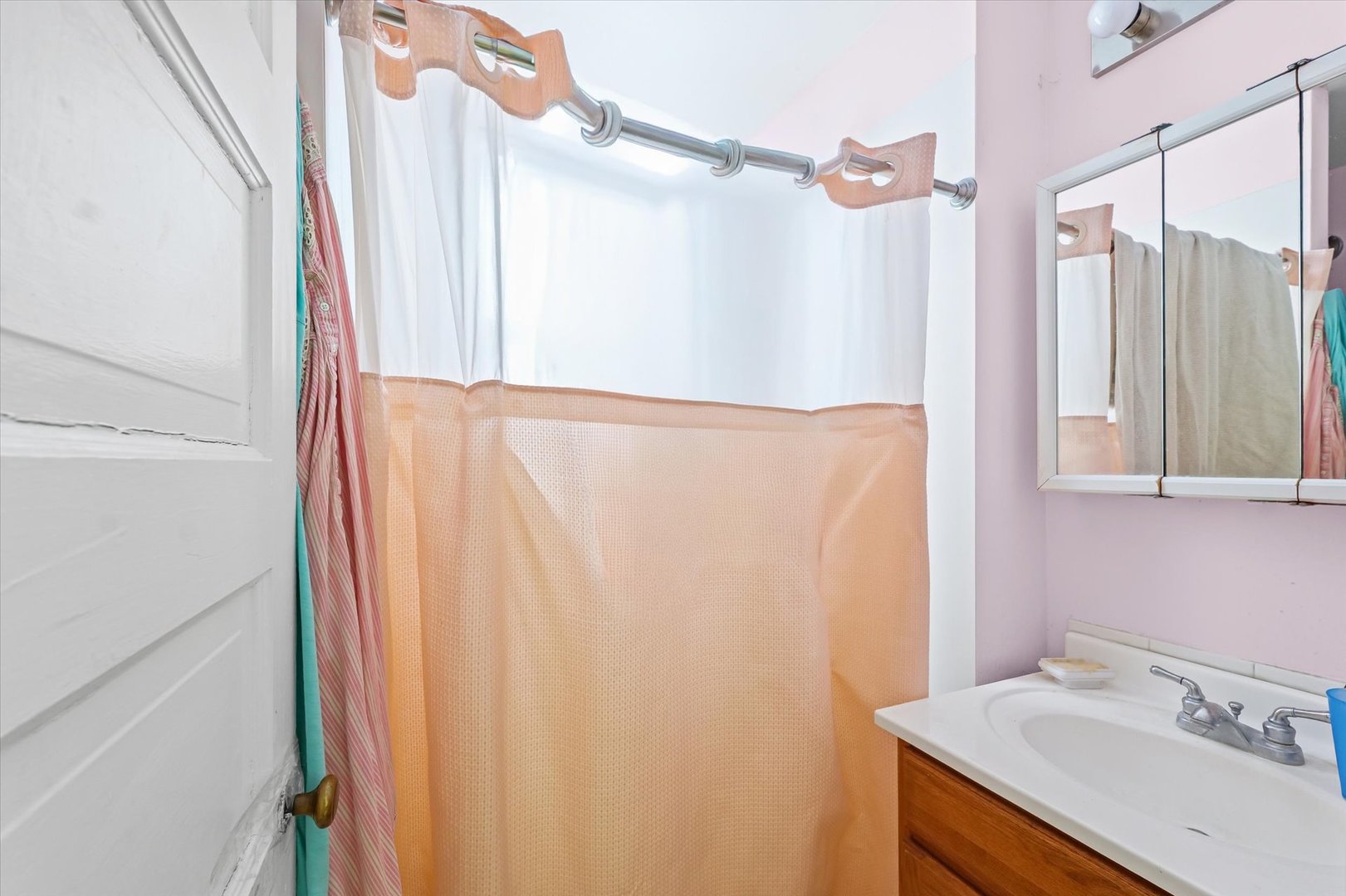524 North State Street Gibson City, IL 60936 - Photo 15 of 22 a bathroom with a sink and mirror