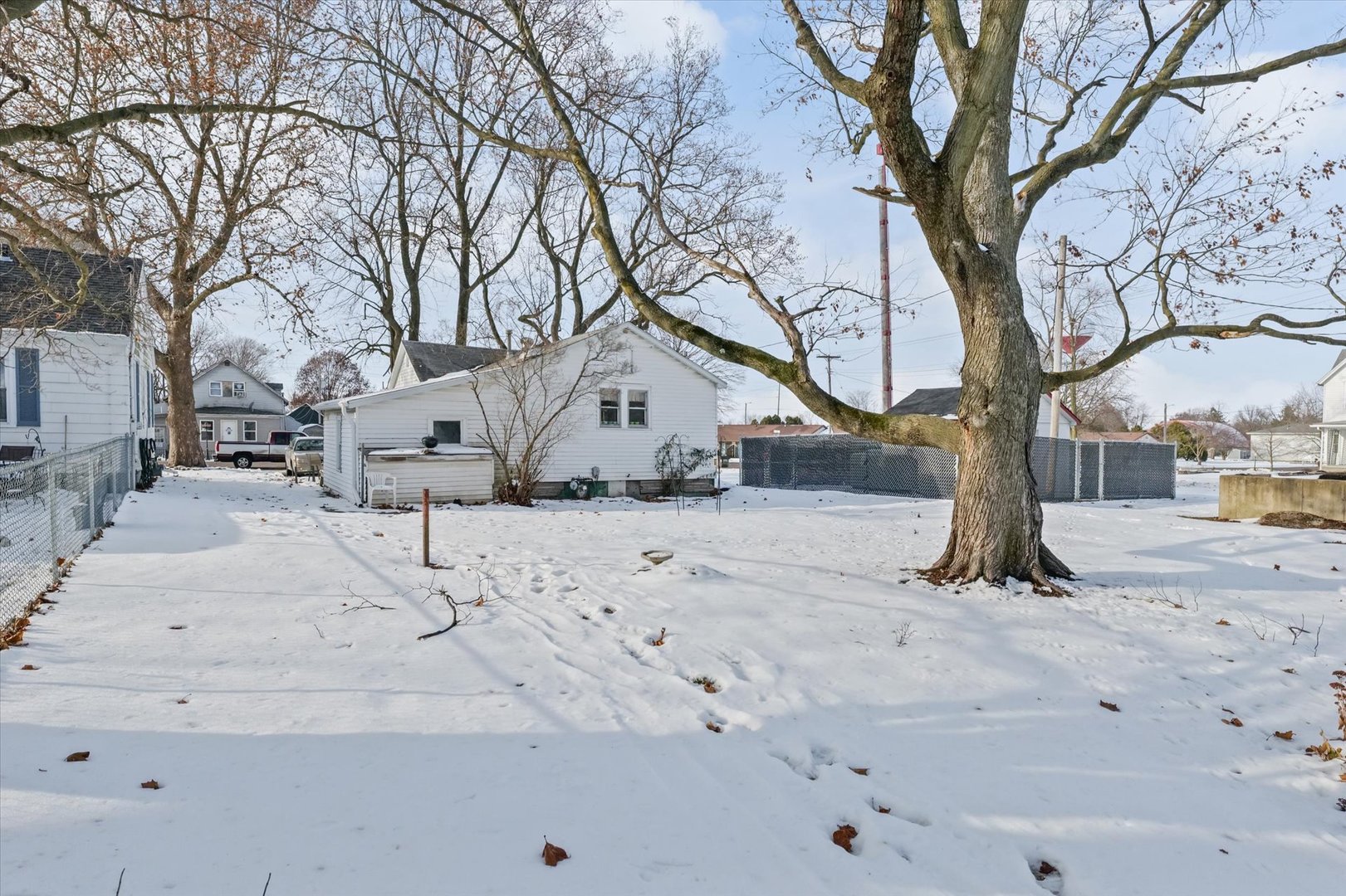 524 North State Street Gibson City, IL 60936 - Photo 18 of 22 a street view with large trees