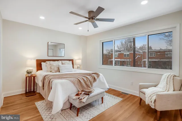 a bed room with a bed and a couch