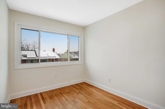 a view of a room that has a window in it