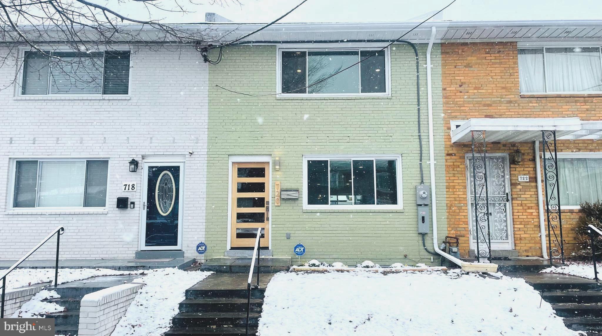 720 Decatur Street Northeast Washington, DC 20017 - Photo 26 of 26 a front view of a house with a yard