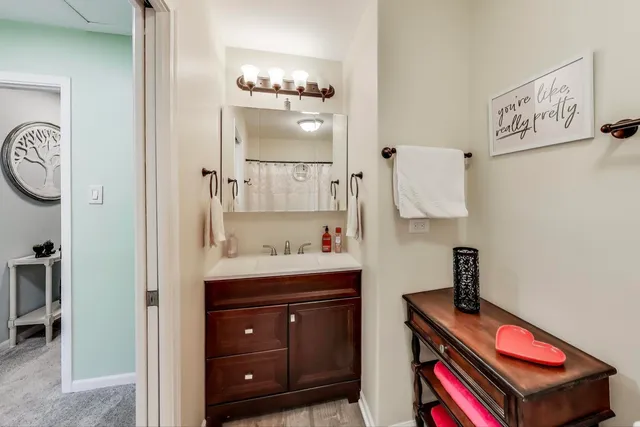 a room with a table and a mirror