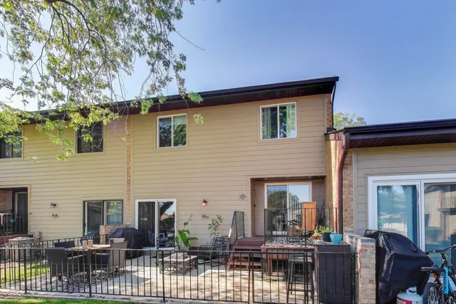 a view of house with outdoor seating space
