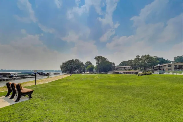 a view of a swimming pool and an outdoor space