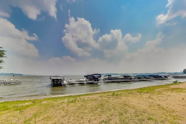 a view of a swimming pool with a garden and stairs
