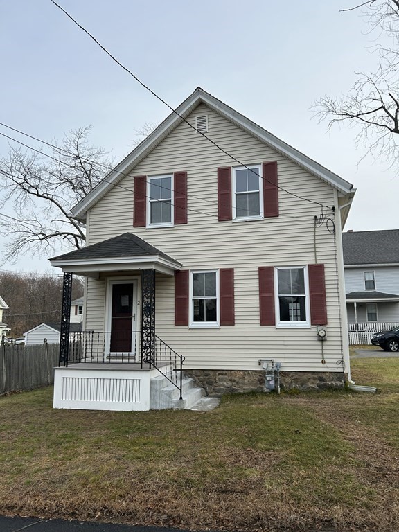 2 Burnside Street Maynard, MA 01754 - Photo 1 of 21 a front view of a house with a yard
