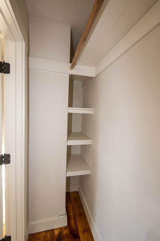 2 Burnside Street Maynard, MA 01754 - Photo 16 of 21 a view of walk in closet with empty racks
