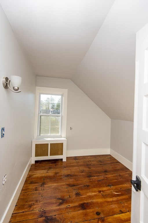 2 Burnside Street Maynard, MA 01754 - Photo 20 of 21 a view of an empty room with wooden floor and a window